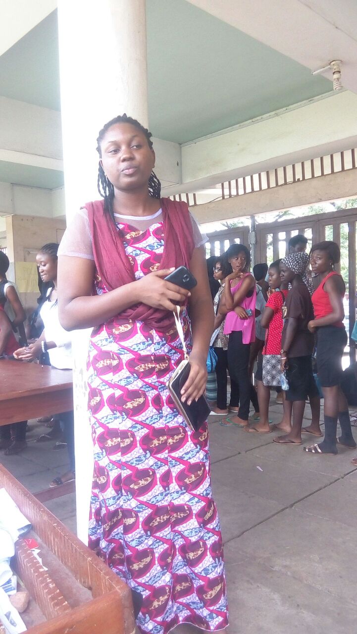 This girl has been caught campaigning for an aspirant in Queens Hall and has been told by an officer that she will face SDC